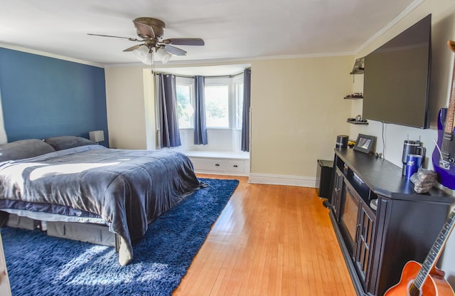 500 W Chicago St, Coldwater, MI 49036 - bedroom featuring light wood finished floors, crown molding, and ceiling fan
