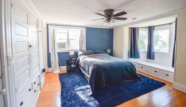 500 W Chicago St, Coldwater, MI 49036 - bedroom with light wood-type flooring, crown molding, and ceiling fan