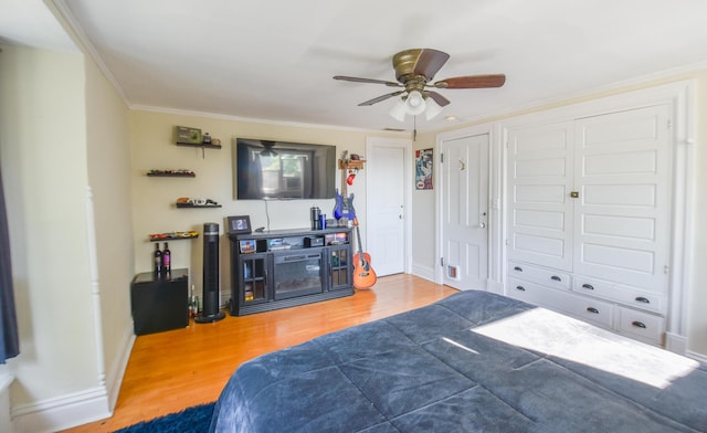 500 W Chicago St, Coldwater, MI 49036 - bedroom featuring wood finished floors, ornamental molding, and a ceiling fan