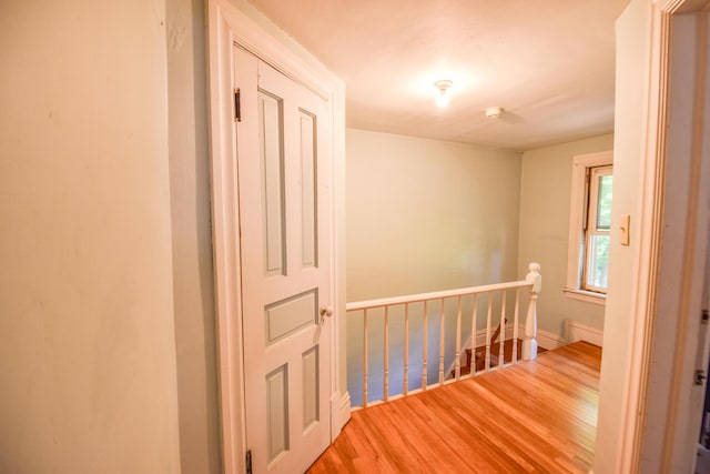 500 W Chicago St, Coldwater, MI 49036 - corridor featuring wood finished floors and an upstairs landing