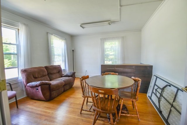 500 W Chicago St, Coldwater, MI 49036 - dining room with healthy amount of natural light, wood finished floors, and crown molding