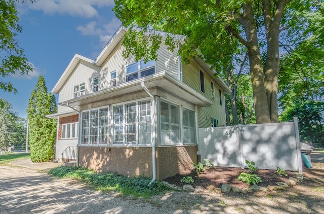 500 W Chicago St, Coldwater, MI 49036 - view of property exterior featuring a sunroom