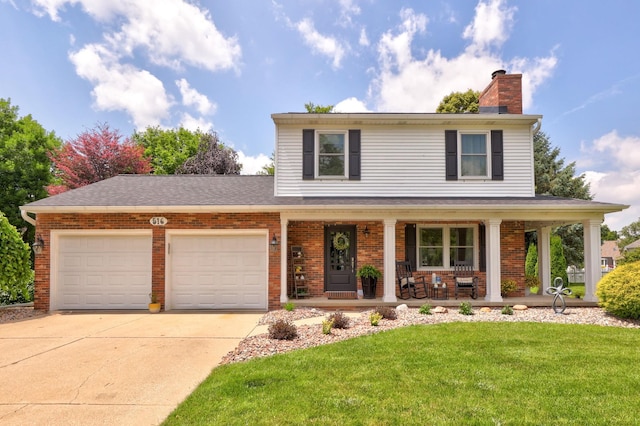 516 Zehnder Dr, Frankenmuth, MI 48734 - view of front of home featuring a porch, a garage, a front lawn, and brick siding