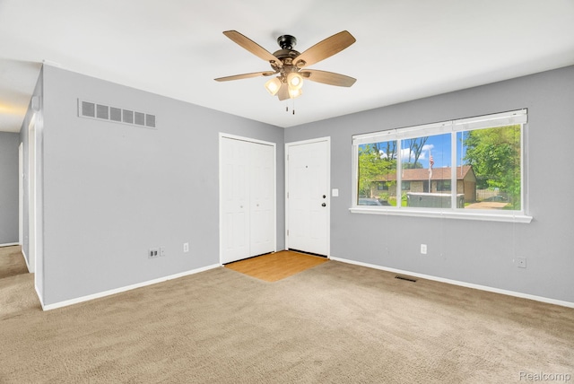 35057 Markey St, Westland, MI 48186 - empty room with carpet floors and a ceiling fan