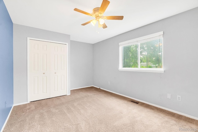 35057 Markey St, Westland, MI 48186 - unfurnished bedroom featuring carpet floors, a closet, and a ceiling fan