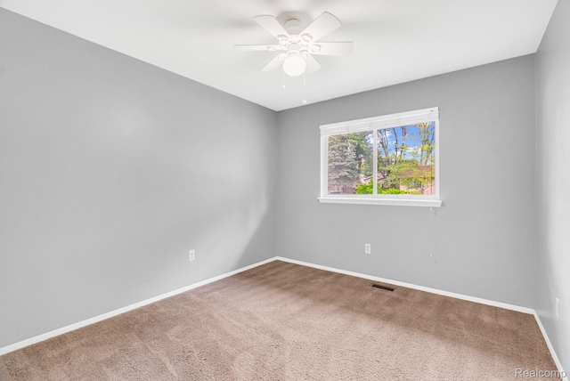 35057 Markey St, Westland, MI 48186 - empty room with a ceiling fan and carpet flooring