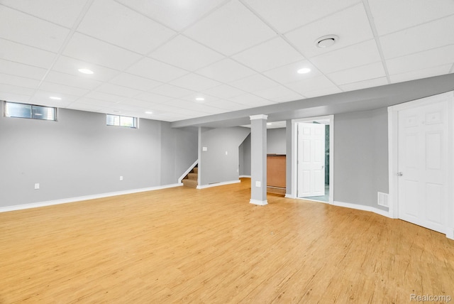 35057 Markey St, Westland, MI 48186 - below grade area with light wood finished floors, stairway, recessed lighting, and a paneled ceiling