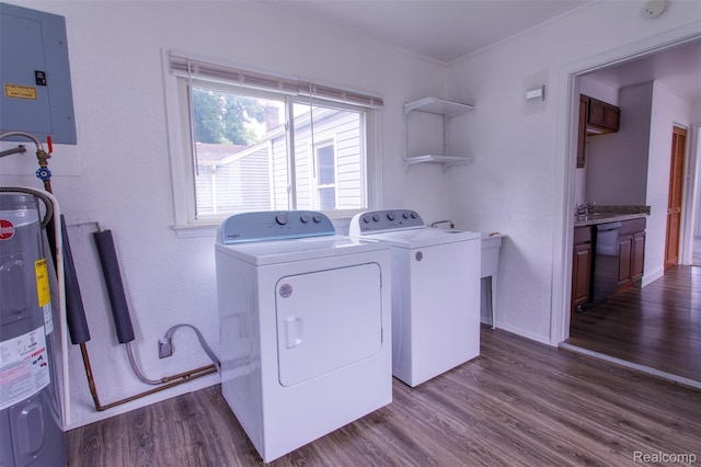 27700 Dartmouth St, Troy, MI 48071 - laundry room featuring electric panel, washing machine and clothes dryer, dark wood finished floors, and electric water heater