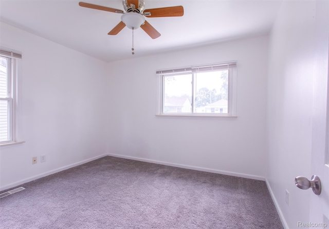 27700 Dartmouth St, Troy, MI 48071 - carpeted spare room featuring plenty of natural light and a ceiling fan