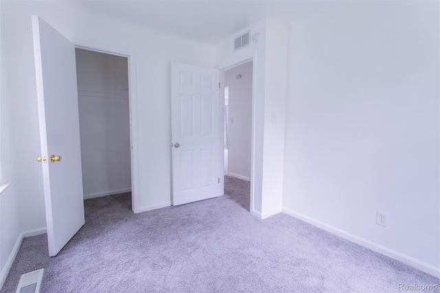 27700 Dartmouth St, Troy, MI 48071 - unfurnished bedroom featuring carpet flooring and a walk in closet