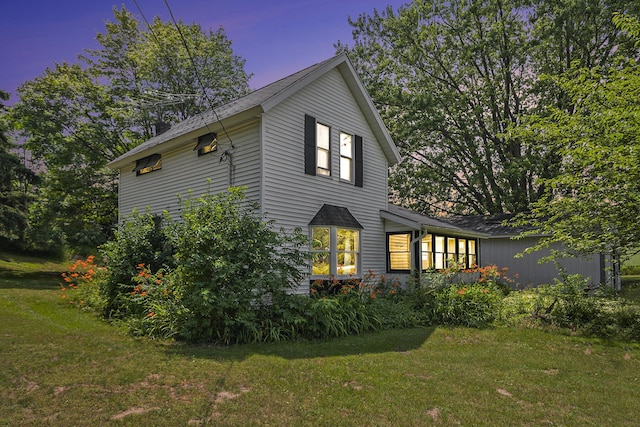 7035 W Filmore Rd, Mears, MI 49436 - view of side of home featuring a lawn