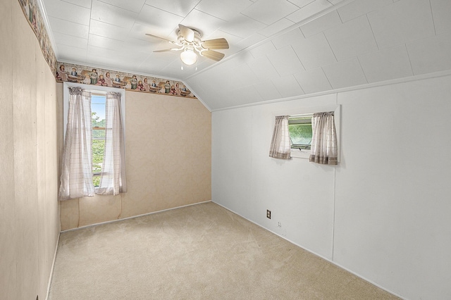 7035 W Filmore Rd, Mears, MI 49436 - additional living space with plenty of natural light, a ceiling fan, carpet, and lofted ceiling