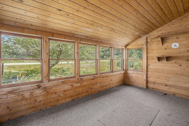 7035 W Filmore Rd, Mears, MI 49436 - unfurnished sunroom featuring lofted ceiling, carpet flooring, wood ceiling, and wooden walls