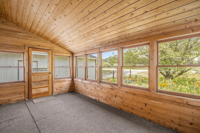 7035 W Filmore Rd, Mears, MI 49436 - unfurnished sunroom with vaulted ceiling, wood walls, carpet flooring, and wood ceiling
