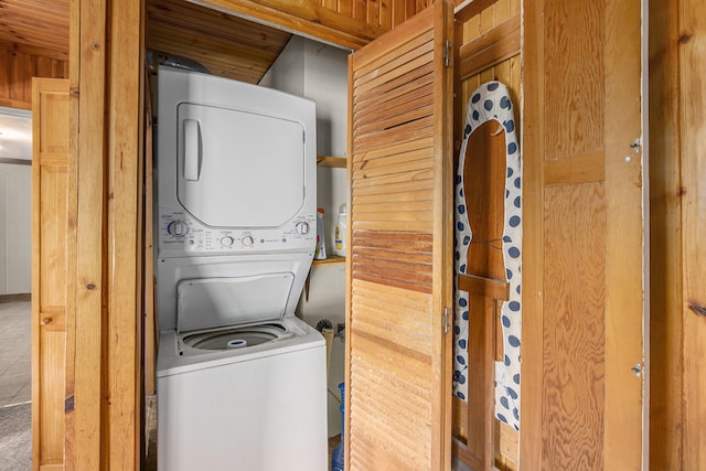 7035 W Filmore Rd, Mears, MI 49436 - washroom featuring estacked washer and dryer and wood ceiling