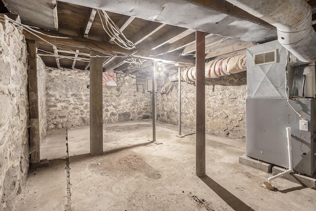 7035 W Filmore Rd, Mears, MI 49436 - unfinished basement featuring heating unit