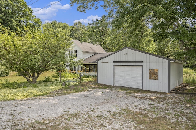 7035 W Filmore Rd, Mears, MI 49436 - detached garage with gravel driveway