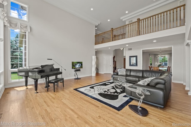 519 Hawksmoore Dr, Clarkston, MI 48348 - living room featuring a high ceiling, wood finished floors, and recessed lighting