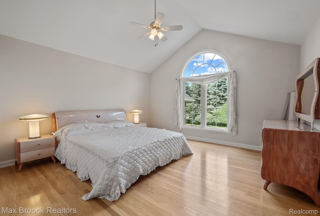 519 Hawksmoore Dr, Clarkston, MI 48348 - bedroom featuring multiple windows, lofted ceiling, light wood-style flooring, and ceiling fan