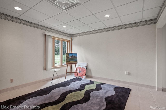 519 Hawksmoore Dr, Clarkston, MI 48348 - tiled empty room featuring a drop ceiling and recessed lighting