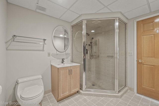 519 Hawksmoore Dr, Clarkston, MI 48348 - bathroom featuring vanity, a shower stall, a paneled ceiling, and tile patterned floors