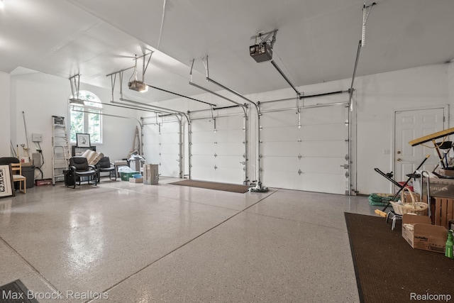 519 Hawksmoore Dr, Clarkston, MI 48348 - garage with a garage door opener