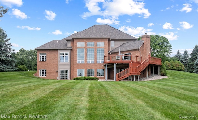 519 Hawksmoore Dr, Clarkston, MI 48348 - back of property featuring stairs, brick siding, a deck, a chimney, and a lawn