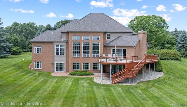 519 Hawksmoore Dr, Clarkston, MI 48348 - back of property featuring stairway, a deck, and a yard