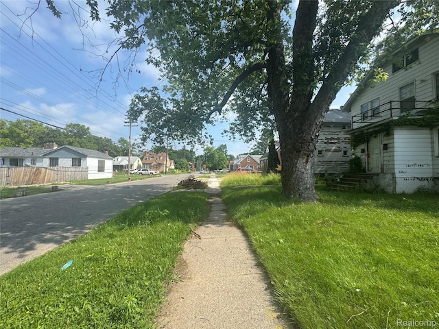 17416 Bentler St, Detroit, MI 48219 - view of asphalt road featuring a residential view