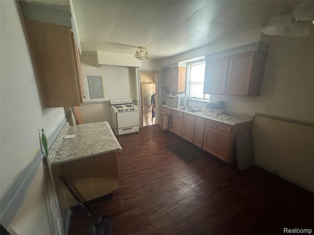 17416 Bentler St, Detroit, MI 48219 - kitchen featuring dark wood-style flooring, white range with gas cooktop, and electric panel