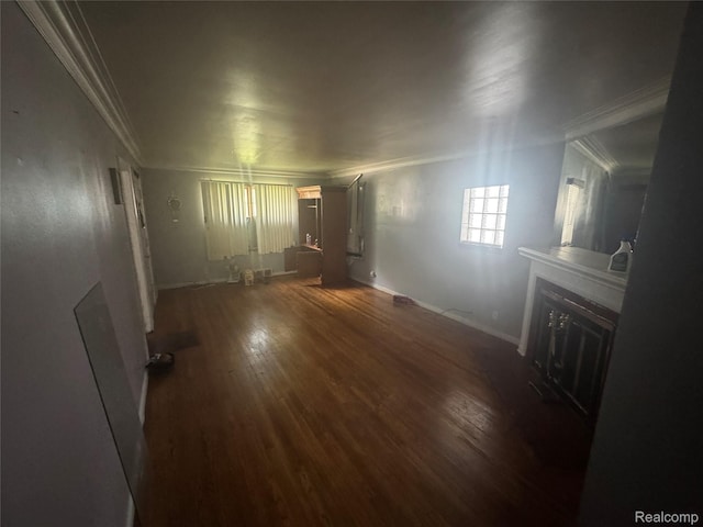 17416 Bentler St, Detroit, MI 48219 - unfurnished living room featuring ornamental molding, wood finished floors, and a fireplace