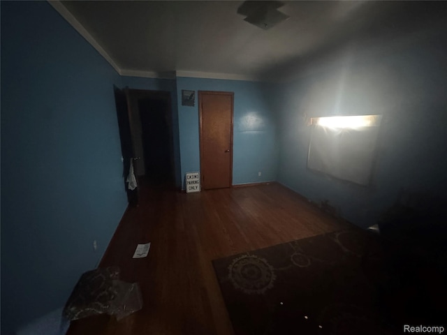 17416 Bentler St, Detroit, MI 48219 - unfurnished bedroom featuring wood finished floors and ornamental molding