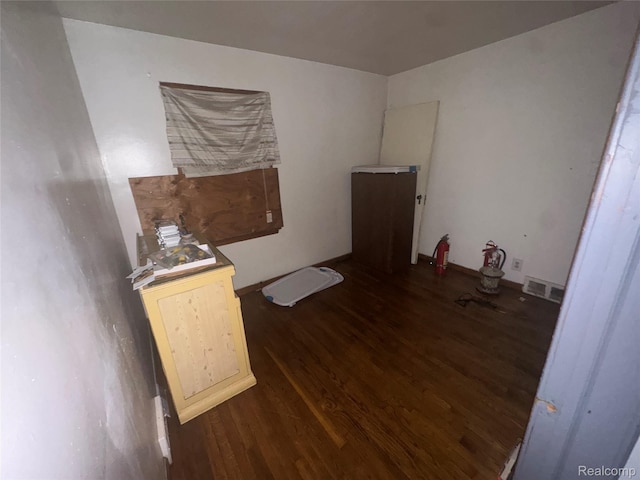 17416 Bentler St, Detroit, MI 48219 - unfurnished bedroom featuring dark wood-style floors