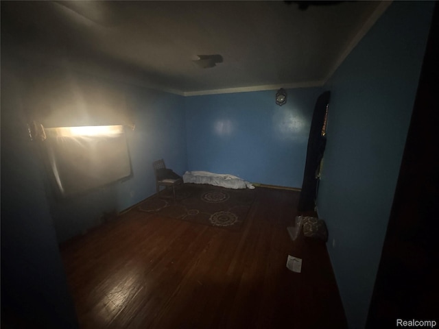 17416 Bentler St, Detroit, MI 48219 - empty room with wood finished floors, crown molding, and arched walkways