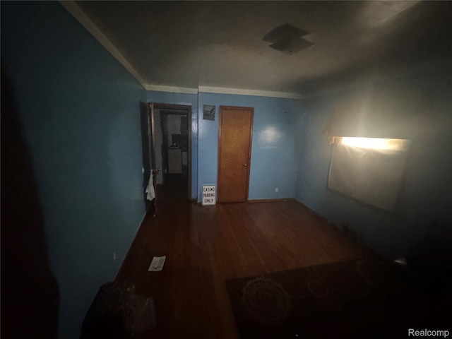 17416 Bentler St, Detroit, MI 48219 - unfurnished bedroom featuring wood finished floors and crown molding