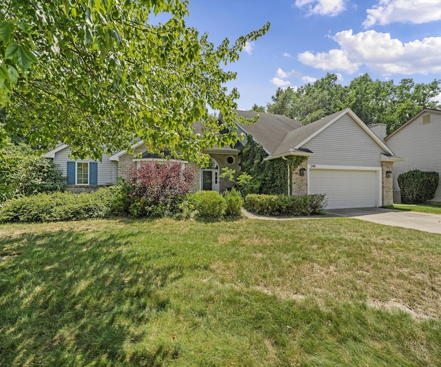 2418 Meadowridge Ct, Ann Arbor, MI 48105 - view of front of home featuring an attached garage, concrete driveway, brick siding, and a front lawn