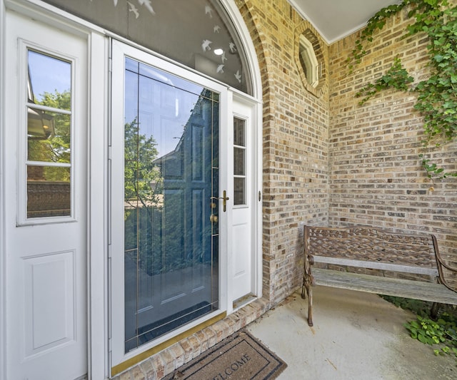 2418 Meadowridge Ct, Ann Arbor, MI 48105 - doorway to property featuring brick siding