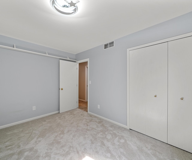 2418 Meadowridge Ct, Ann Arbor, MI 48105 - unfurnished bedroom with carpet floors and a closet
