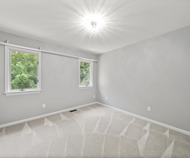 2418 Meadowridge Ct, Ann Arbor, MI 48105 - empty room with baseboards and carpet flooring