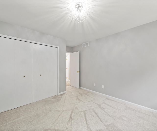 2418 Meadowridge Ct, Ann Arbor, MI 48105 - unfurnished bedroom with a closet and carpet