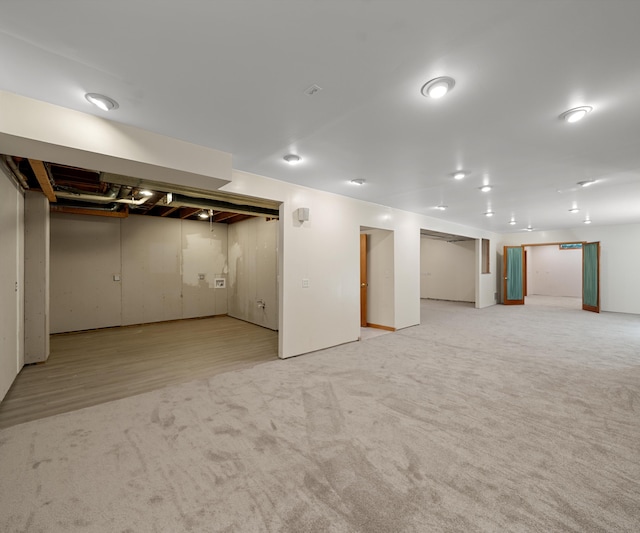 2418 Meadowridge Ct, Ann Arbor, MI 48105 - finished below grade area featuring carpet flooring