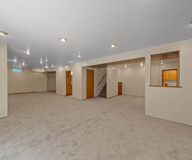 2418 Meadowridge Ct, Ann Arbor, MI 48105 - basement featuring stairs and carpet floors
