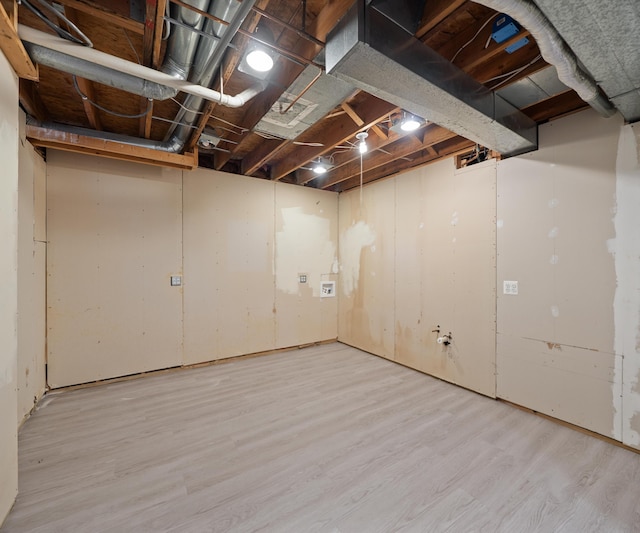 2418 Meadowridge Ct, Ann Arbor, MI 48105 - unfinished basement with wood finished floors
