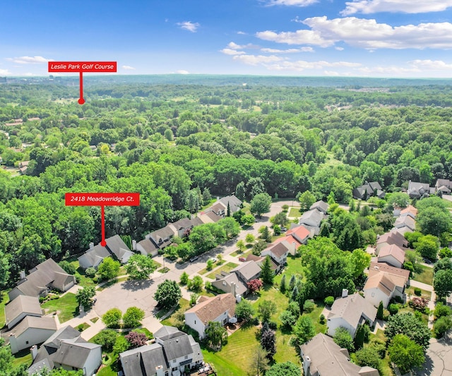 2418 Meadowridge Ct, Ann Arbor, MI 48105 - aerial perspective of suburban area featuring a heavily wooded area