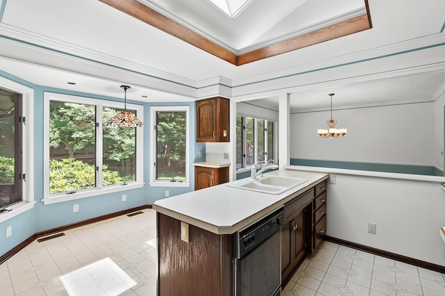1130 W G Ave, Kalamazoo, MI 49009 - kitchen with dishwasher, light countertops, a chandelier, and hanging light fixtures