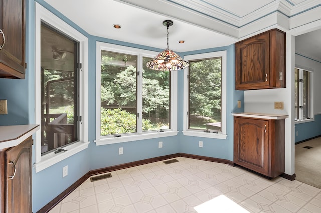 1130 W G Ave, Kalamazoo, MI 49009 - unfurnished dining area with baseboards and light flooring