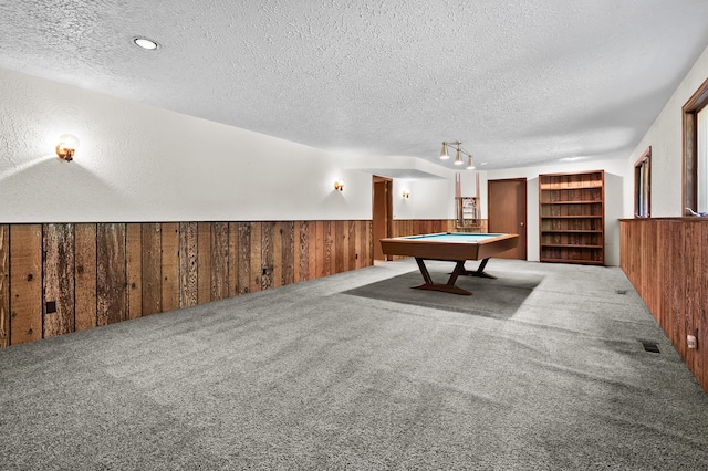 1130 W G Ave, Kalamazoo, MI 49009 - game room with wood walls, a textured ceiling, wainscoting, pool table, and carpet floors
