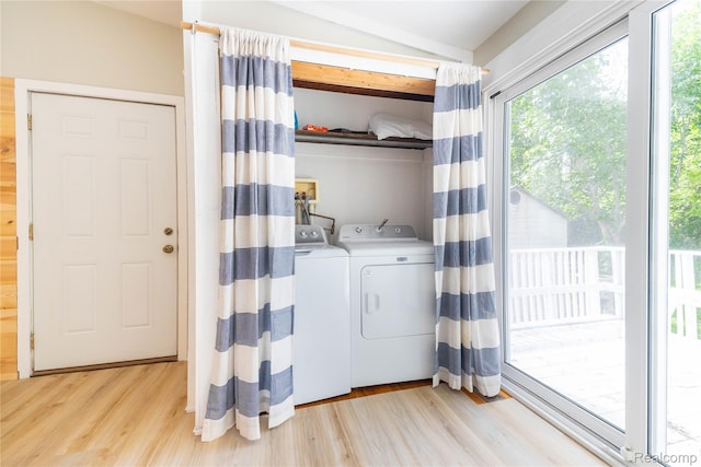 8614 Lake Rd, Grosse Ile, MI 48138 - laundry area featuring washer and clothes dryer and light wood finished floors