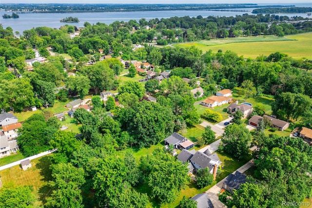8614 Lake Rd, Grosse Ile, MI 48138 - aerial overview of property's location with a nearby body of water and nearby suburban area