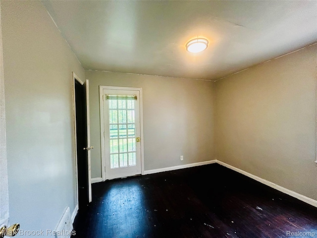 22510 Frisbee St, Detroit, MI 48219 - unfurnished room with wood finished floors and baseboards